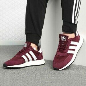 red adidas runners